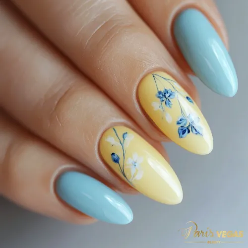 Unha azul e amarela decorada com design criativo e moderno,por designer de unhas perto de mim