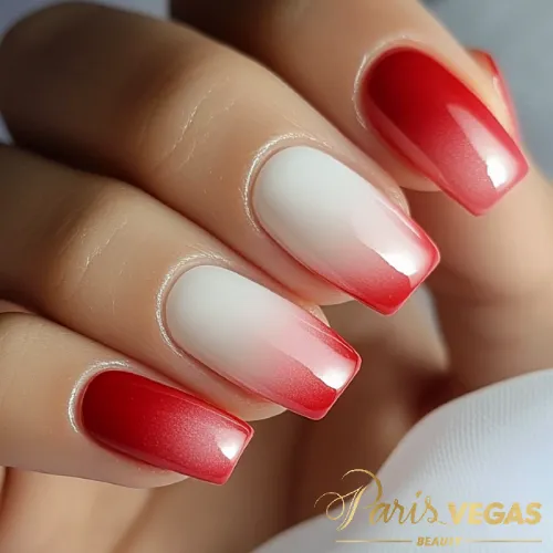 Unhas com esmaltação vermelho degradê, serviço em Moema, Zona Sul de São Paulo.