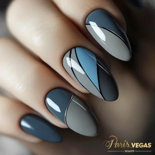 Unhas cinza com design geométrico feitas no salão Paris Vegas Beauty em Moema.