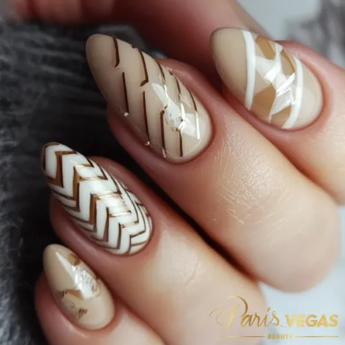 Unhas marrons com design zig zag, criando um visual moderno e dinâmico.