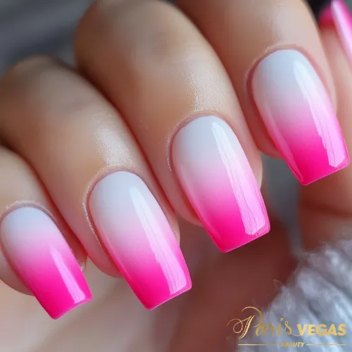 Unhas pink com efeito babyboomer, transição suave entre cores para uma manicure elegante e sofisticada.