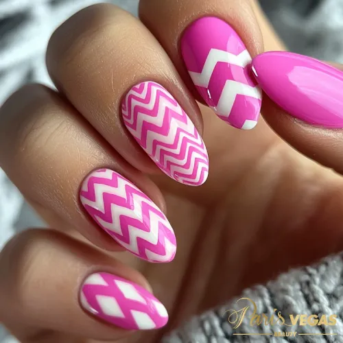 Unhas pink com design zig zag criativo, um estilo moderno e arrojado para suas mãos.