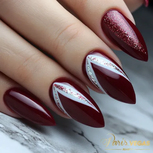 Unhas vinho com glitter, design elegante e brilhante criado por designer de unhas em Moema.