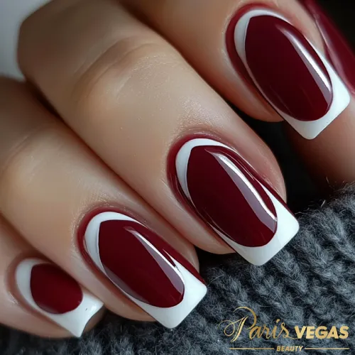 Unhas vinho com francesinha, design clássico e elegante feito por manicure na Zona Sul, Paris Vegas Beauty.